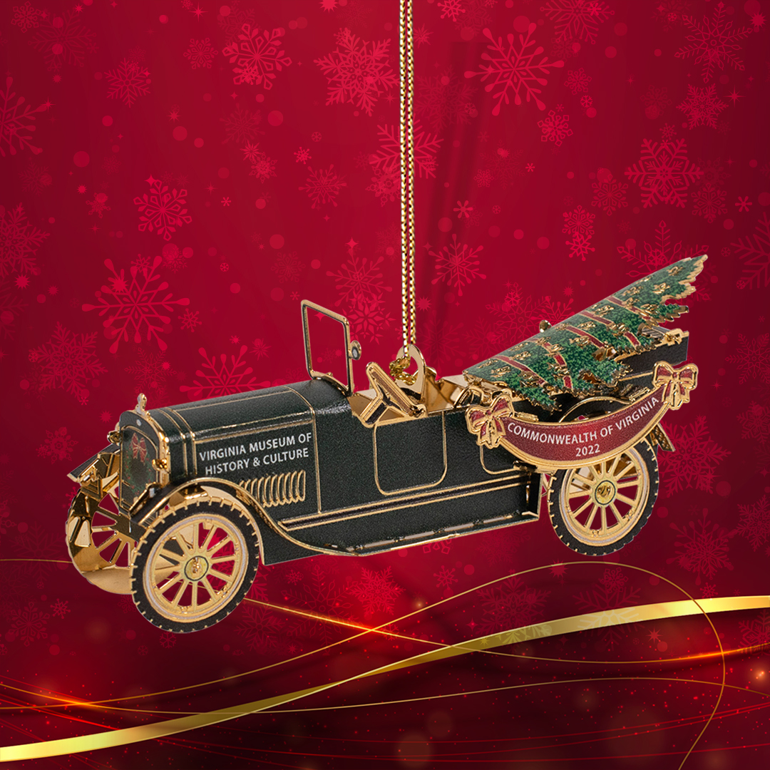 Holiday Ornament - a replica of a 1918 Kline Kar touring car with a Christmas Tree in backseat/trunk area