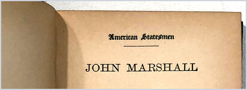 An open book with text: American Statesman: John Marshall