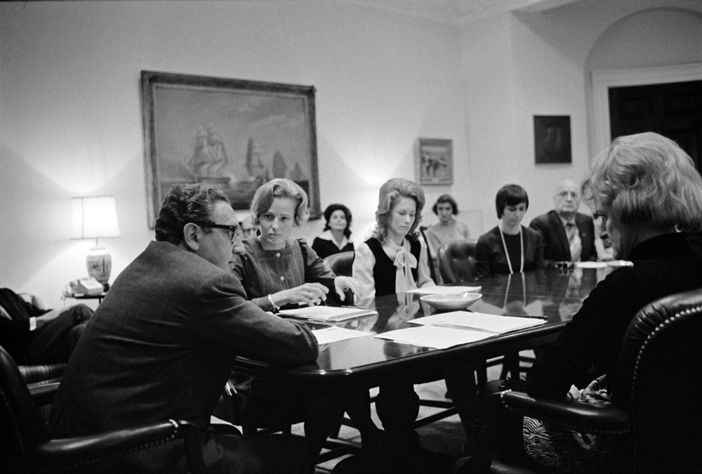 United States National Security Advisor Henry Kissinger meets with Helene Knapp (right), Darlene Sadler (center), and Phyllis Galanti (left) on January 26, 1973. Image courtesy of the Richard Nixon Presidential Library and Museum.