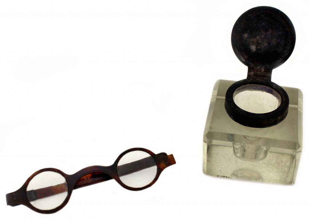 A photograph of Marshall's spectacles and inkwell