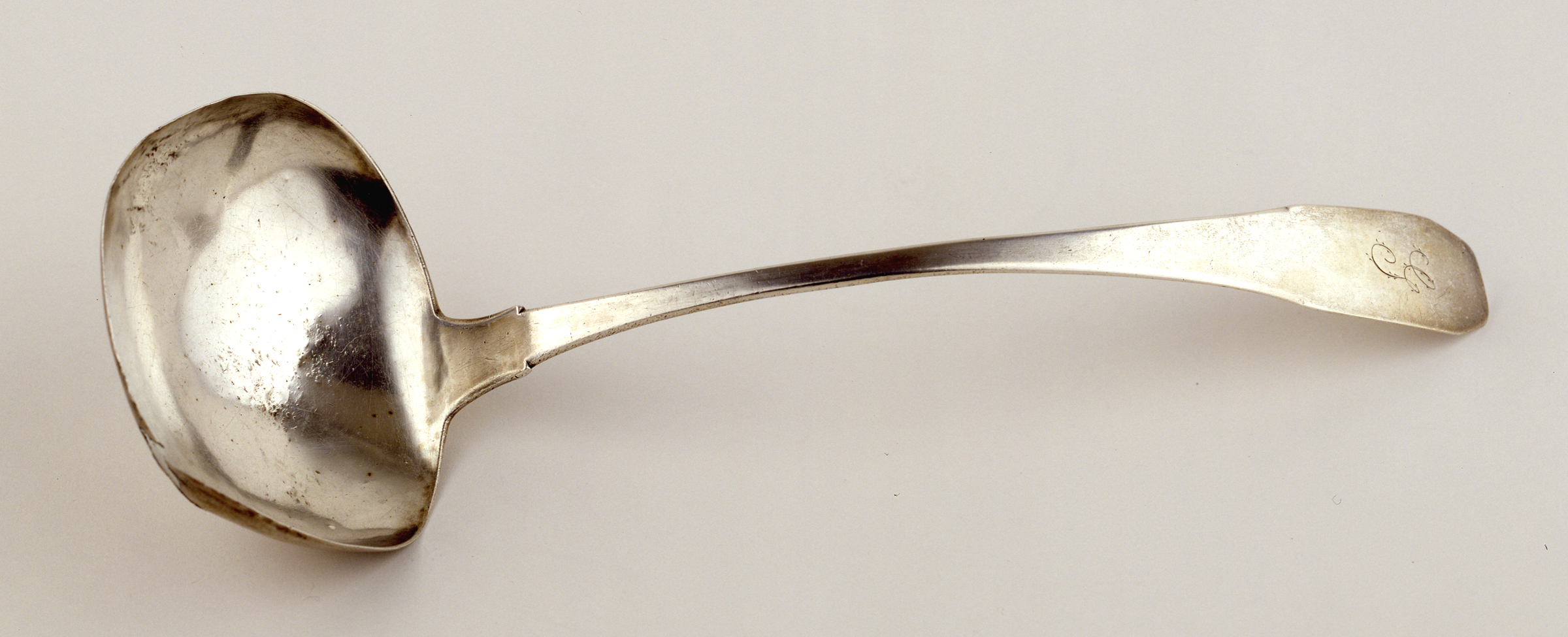 Silver sauce ladle