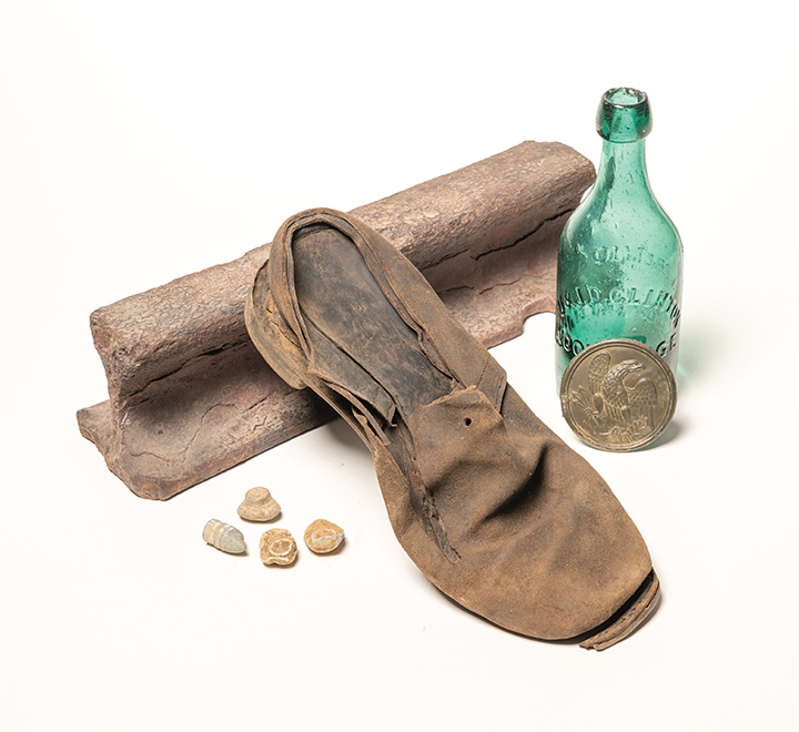 Broken rail from the Potomac Creek Bridge; U & I.D. Clinton “Premium Soda Water” bottle; U.S. cartridge box plate; U.S. Army brogan (shoe); examples of nearly 500 Minié balls recovered from the site of a shooting match held at Falmouth and Virginia in January 1863, among members of the 1st U.S. Sharpshooters