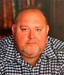 Headshot of author Christian di Spigna