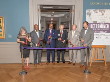 Sponsors and partners cut the ribbon to open the Determined Exhibition in 2019 Sponsors and partners cut the ribbon to open the Determined Exhibition in 2019