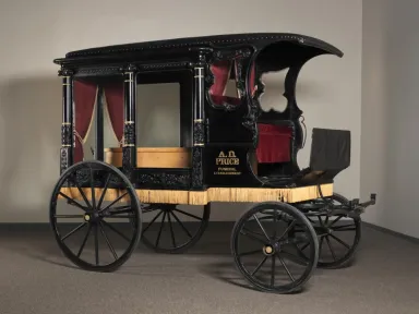 A horse-drawn hearse from the African American–owned A. D. Price Funeral Home