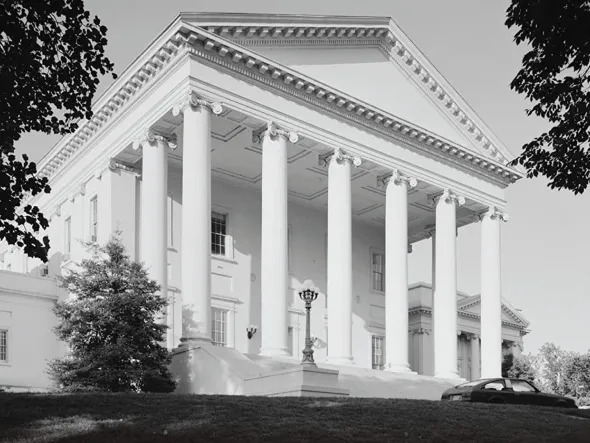 A black and white photo of the Virginia State Capitol building