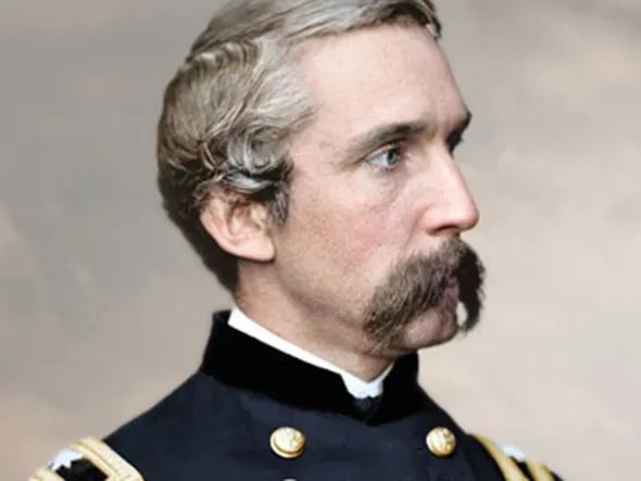 Photo of a man in blue civil war uniform and large mustache