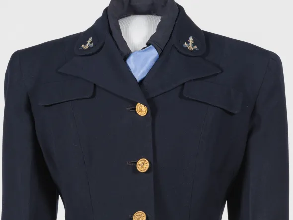 U.S. Navy WAVE Uniform US Navy WAVE uniform. Navy blue jacket with gold buttons and anchor emblem on collar
