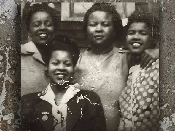 The Black Angels: A Nurse's Story A black and white photo of four smiling women