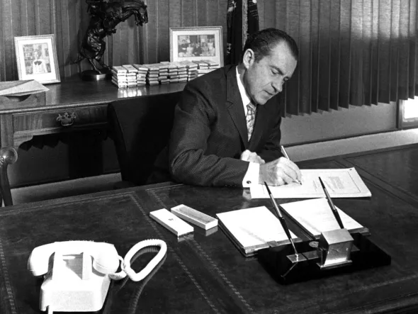 President Nixon signs the National Environmental Policy Act (NEPA) on January 1, 1970.