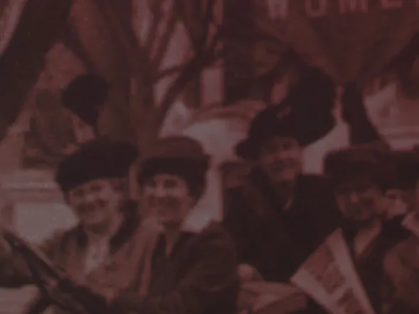 These Things Can Be Done A sepia photograph of women holding Suffrage banners
