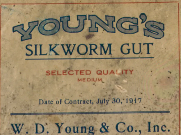 Label with the text, "YOUNG'S SILKWORM GUT / SELECTED QUALITY MEDIUM / Date of Contract, July 30th, 1917"