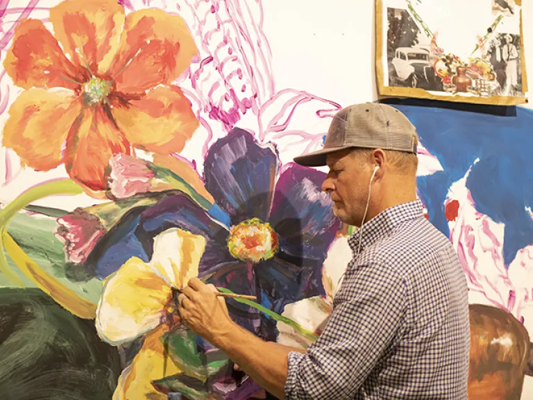 Still Relevant by Ed Trask Ed Trask paints a mural of flowers