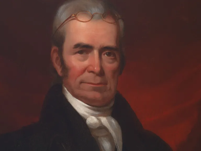 Portrait of John Marshall Portrait of John Marshall - Marshall has grey hair, glasses positioned on top of his head and wears a black jacket with white necktie