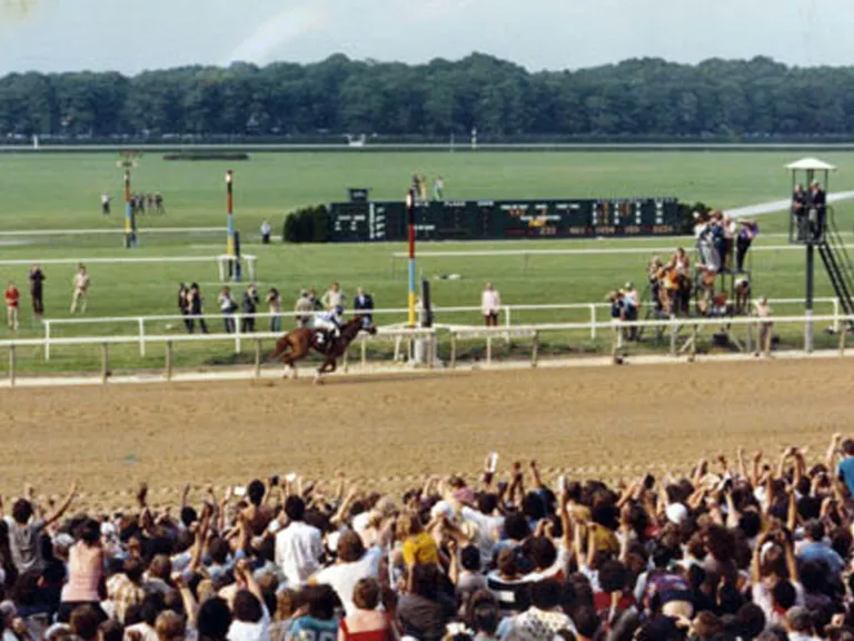 Secretariat winning the Belmont Stakes by 31 lengths. Secretariat winning the Belmont Stakes by 31 lengths.