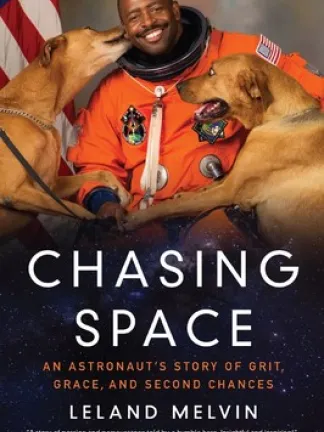 Chasing Space: An Astronaut's Story of Grit, Grace, and Second Chances Book cover for Chasing Space: An Astronaut's Story of Grit, Grace, and Second Chances shows astronaut Leland Melvin in his orange spacesuit with his two large brown dogs