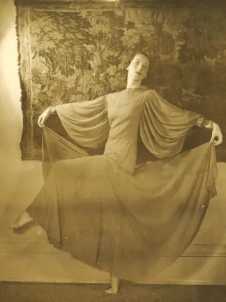 Julia Mildred Harper Marston dancing in a long dress.