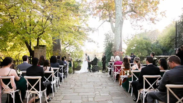 Walkway at Virginia House lined with guests in chairs waiting on bride to walk down the aisle