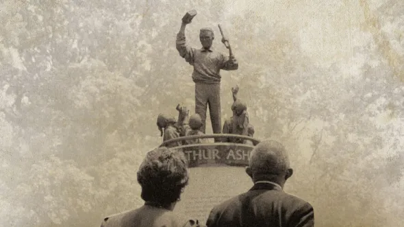 A sepia-toned photo of the Arthur Ashe statue