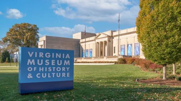 View of museum from corner of Arthur Ashe Boulevard and Kensington Avenue with museum sign in left bottom corner