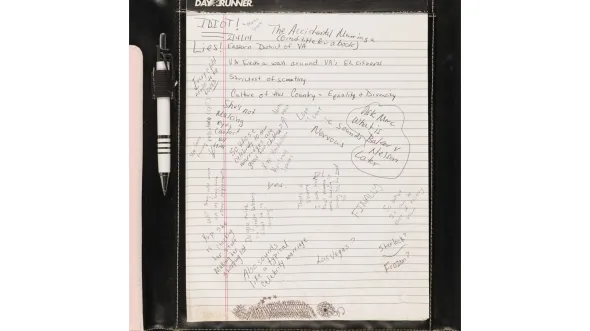 A color photograph of a DayRunner notebook with comments by Carol Schall, Mary Townley, and Emily Schall-Townley