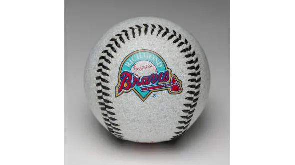 A baseball with the Richmond Braves logo on it