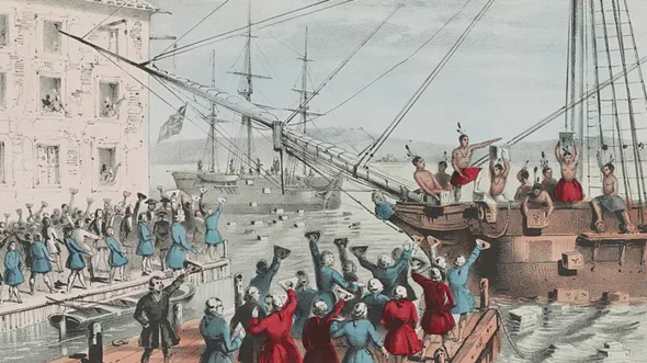 An illustration of the Boston Tea Part, with people standing on docks and aboard ships dumping crates into the harbor