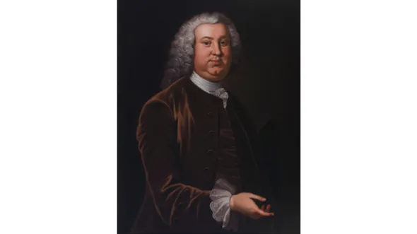A painting of Peyton Randolph with a wig, brown jacket, and white frilled shirt