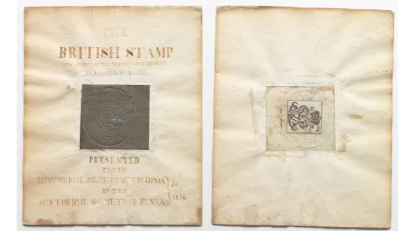 The front and back of a revenue stamp from the British Stamp Act in 1765.