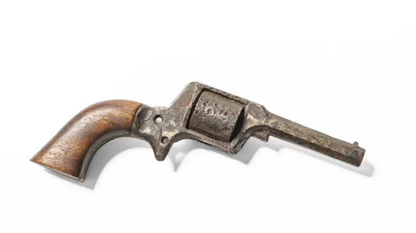 Pocket revolver recovered from campsite of the 9th New Hampshire Infantry near Falmouth and Virginia. D.P. Newton, a master carpenter, fashioned the new walnut grip. 