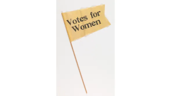 A color photograph of a “Votes for Women” flag, about 1912 