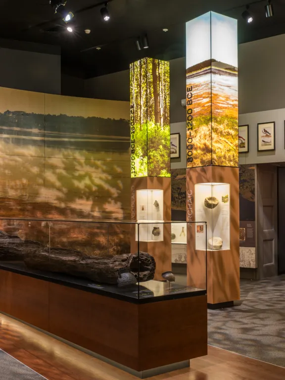 Story of Virginia Gallery with dugout canoe in foreground