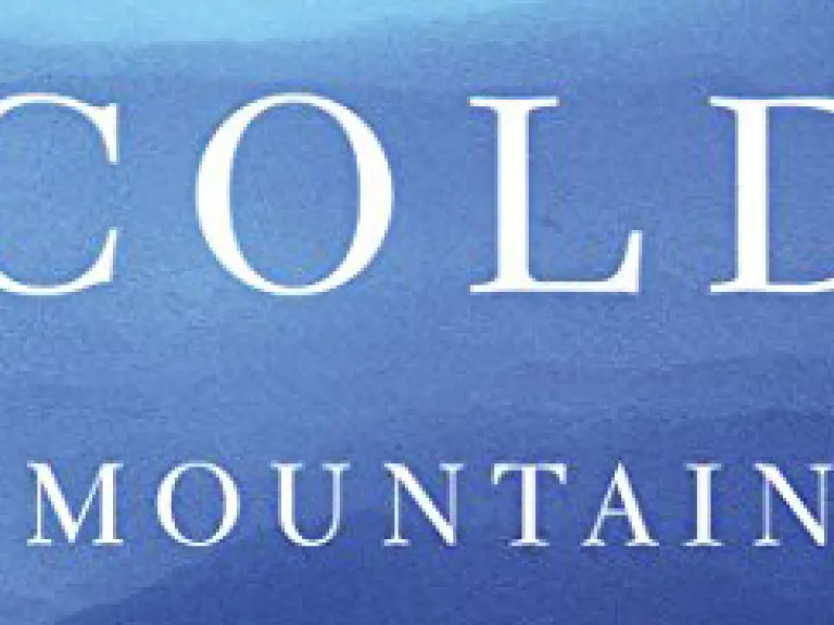 White words on a blue background: Cold Mountain
