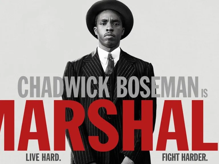 A black and white photo of Chadwick Boseman dressed in a black suit and black bowler hat with overlaid text: Chadwick Boseman is Marshall, Live Hard, Fight Harder.