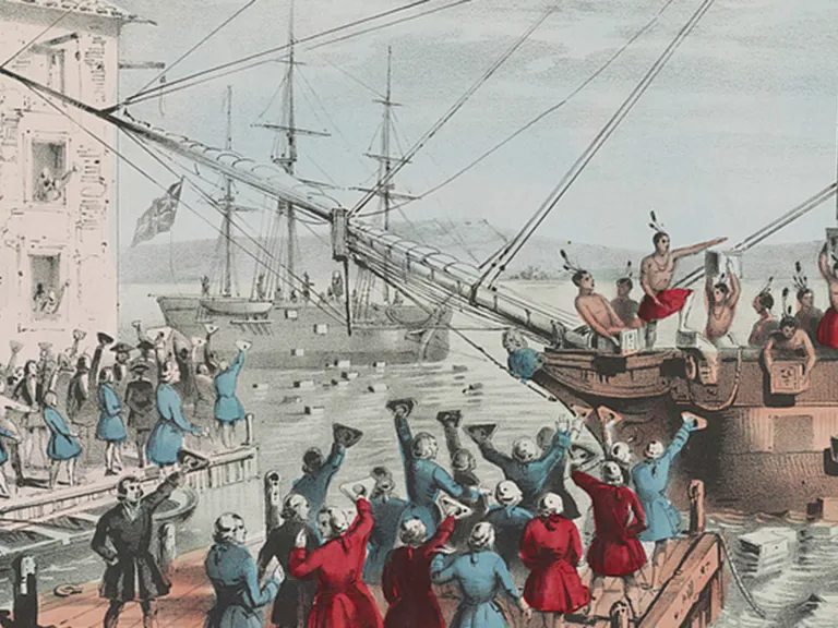 An illustration of the Boston Tea Part, with people standing on docks and aboard ships dumping crates into the harbor