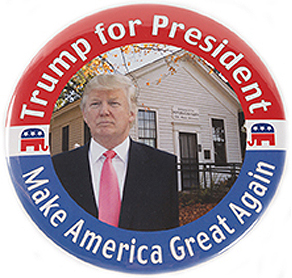 Campaign button showing a colored photograph of Donals Trump in front of a grey house with the text, “Trump for President / Make America Great Again.”