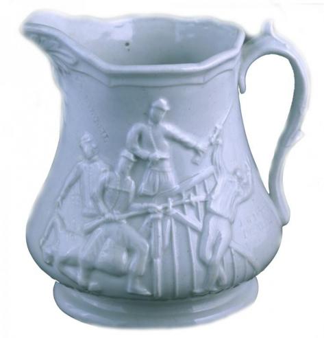 A pitcher made to commorate the dramatic death of Elmer Ellsworth on May 24, 1861. (VHS accession number: 2008.123.1) A White Ellsworth pitcher with an Engraving of Fighting Soldiers
