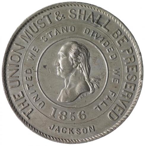 Silver rebus medalet with the side profile of James Buchanan and the words, “THE UNION MUST & SHALL BE PRESERVED/ UNITED WE STAND DIVIDED WE FALL/ 1856/ JACKSON” engraved around his image. 