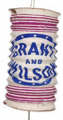 A red, white, and blue paper lantern with the text, “GRANT AND WILSON” from the Grant campaign. 