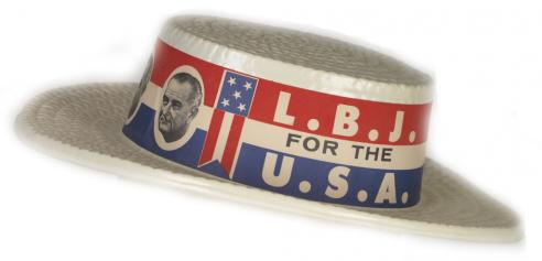 A red, white, and blue hat from the Lyndon Johnson campaign with the words “L.B.J. FOR THE U.S.A.”